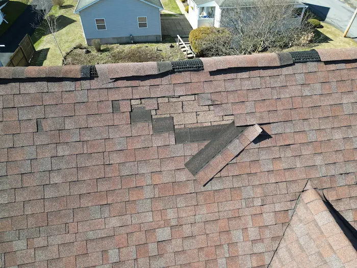 Asphalt shingle roof repair completed by Zenobi Roofing in Mayfield Pennsylvania.