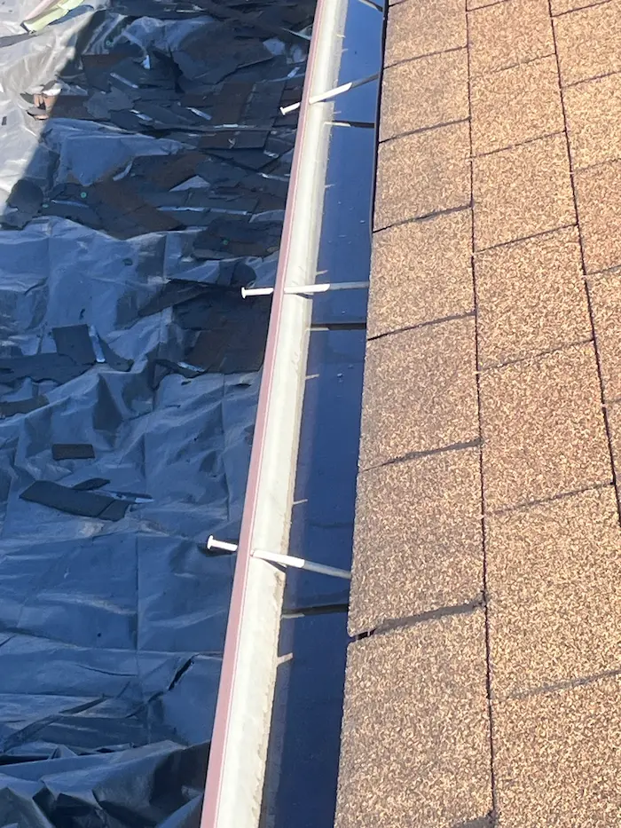 Clogged gutter holding water on a home in Scranton Pennsylvania