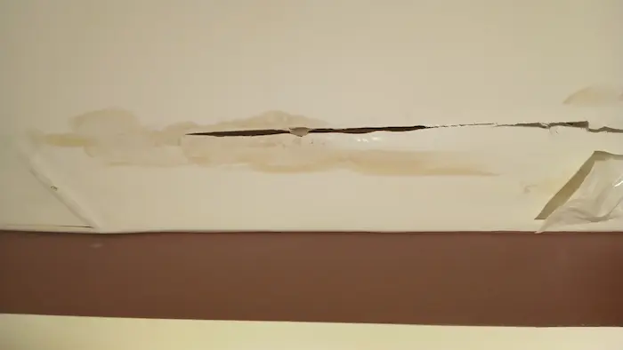 Water leaking through a ceiling from a roof leak in Northeast Pennsylvania
